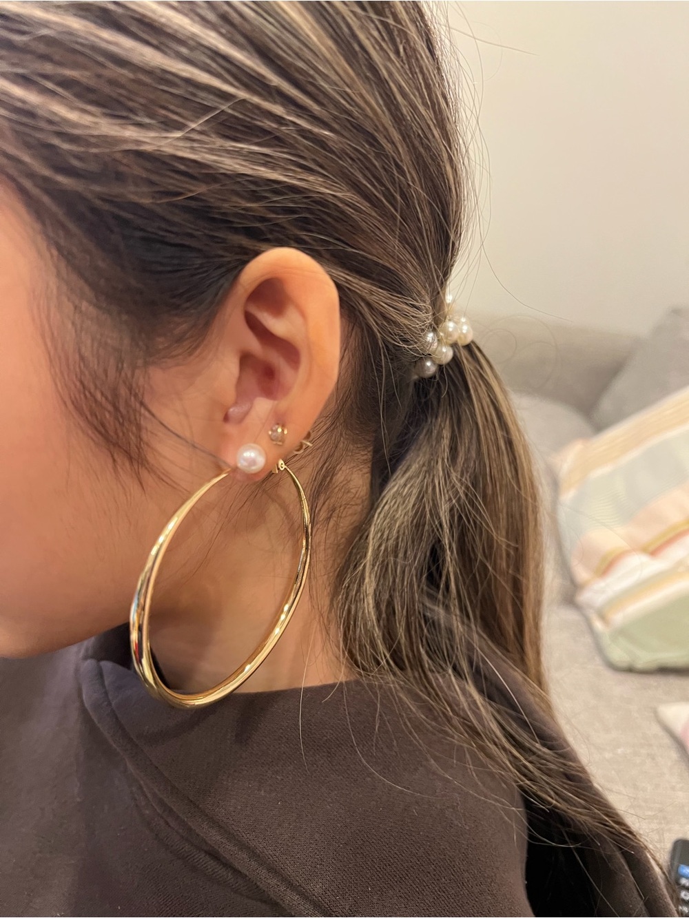 70mm gold-tone hoop earrings.